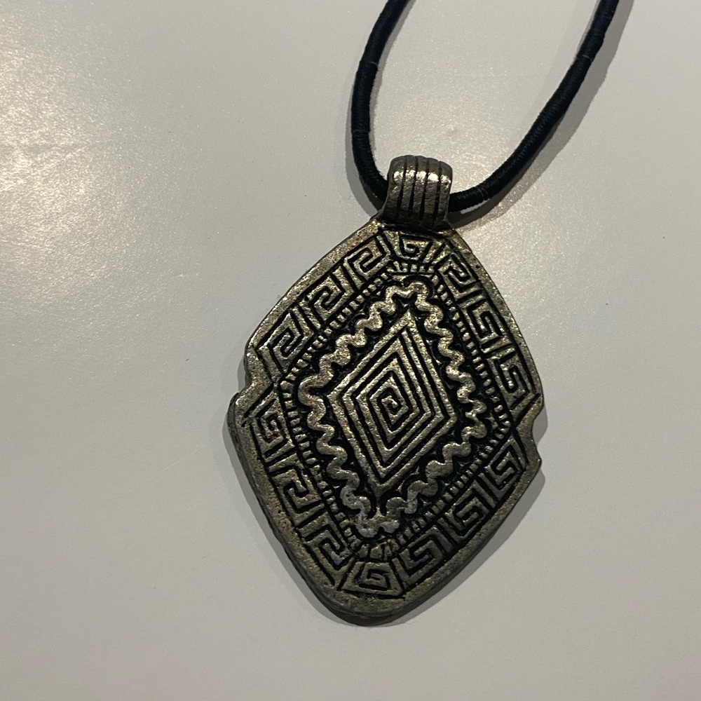 Intricate Black Cord Necklace with Geometric Pendant